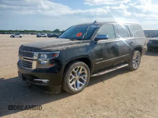 2015 Chevrolet Tahoe LTZ с VIN 1GNSCCKCXFR724749, выставлен на аукционе Copart как лот 64147065 с пробегом Не указан миль и Списание • Salvage title. История ставок и продаж доступна на DreamBid. Изображение 1.