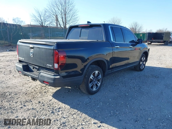 2019 Honda Ridgeline RTL-E with VIN 5FPYK3F7XKB033652, listed as a IAAI auction lot 41751421 with 96,774 mi miles and . Bid and sale history available at DreamBid. Image 4.