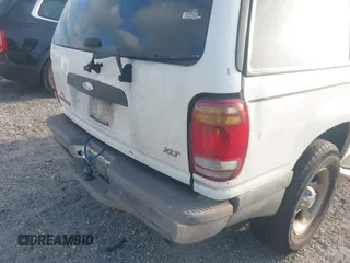 1998 Ford Explorer XLT z VIN 1FMZU32P9WZC01127, wystawiony jako IAAI lot #42310558 z przebiegiem Nie podano mil oraz . Historia ofert i sprzedaży dostępna na DreamBid. Obrazek 13.