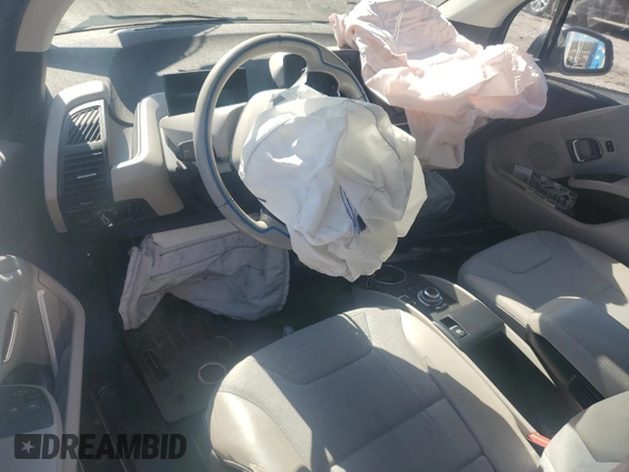 2015 BMW i3 z VIN WBY1Z4C51FV502745, wystawiony jako Copart lot #51739575 z przebiegiem Nie podano mil oraz Szkoda całkowita • Salvage title. Historia ofert i sprzedaży dostępna na DreamBid. Obrazek 8.