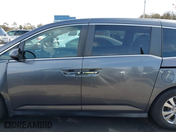 2014 Honda Odyssey EX-L with VIN 5FNRL5H64EB055807, listed as a IAAI auction lot 41760758 with 144,346 mi miles and . Bid and sale history available at carsss.com. Image 14.