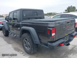 2020 Jeep Gladiator Rubicon with VIN 1C6JJTBG8LL135573, listed as a IAAI auction lot 41585896 with 79,070 mi miles. Bid and sale history available at carsss.com. Image 3.
