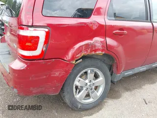 2010 Ford Escape Limited z VIN 1FMCU0EG5AKC21828, wystawiony jako IAAI lot #42343582 z przebiegiem 135 534 mil mil oraz . Historia ofert i sprzedaży dostępna na DreamBid. Obrazek 6.