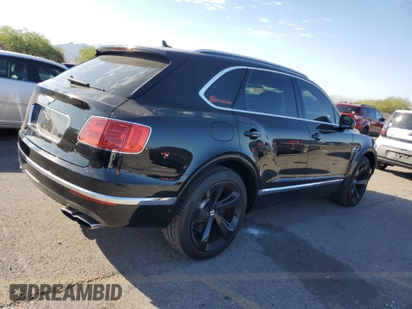 2019 Bentley Bentayga V8 z VIN SJAAM2ZV5KC024154, wystawiony jako Copart lot #74990344 z przebiegiem 41 589 mil mil oraz Szkoda całkowita • Salvage title. Historia ofert i sprzedaży dostępna na DreamBid. Obrazek 3.