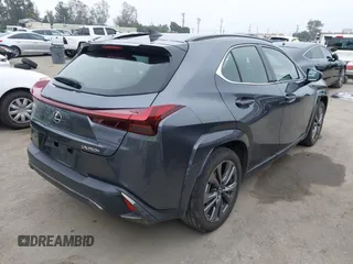 2023 Lexus UX 250h F Sport z VIN JTHB6JBH9P2132431, wystawiony jako IAAI lot #42137625 z przebiegiem 15 923 mil mil oraz . Historia ofert i sprzedaży dostępna na DreamBid. Obrazek 4.