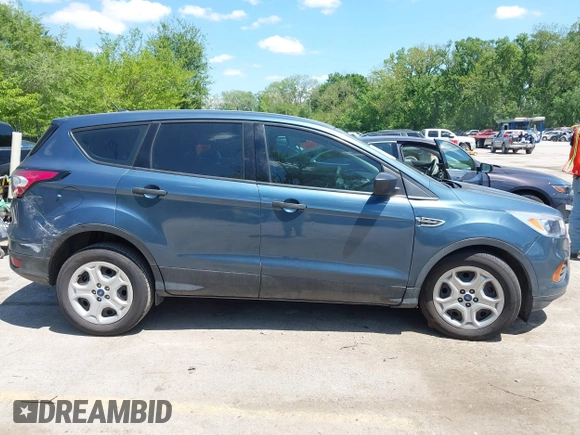 2018 Ford Escape S z VIN 1FMCU0F79JUA63979, wystawiony jako IAAI lot #42184819 z przebiegiem 125 720 mil mil oraz . Historia ofert i sprzedaży dostępna na DreamBid. Obrazek 13.