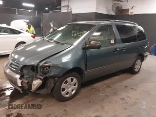 2003 Toyota Sienna CE with VIN 4T3ZF19C03U510244, listed as a IAAI auction lot 41441599 with 126,030 mi miles. Bid and sale history available at carsss.com. Image 2.