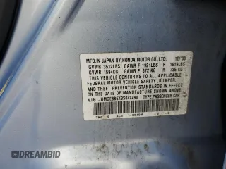 2009 Honda Fit Sport w/Navi with VIN JHMGE886X9S042490, listed as a Copart auction lot 86179244 with 109,130 mi miles and Salvage Title. Bid and sale history available at carsss.com. Image 12.