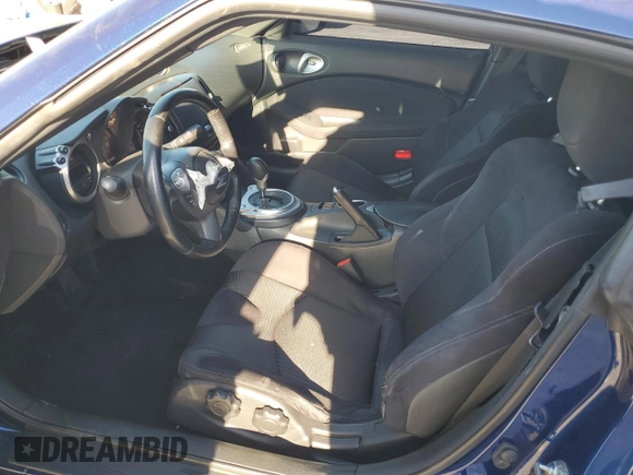 2017 Nissan 370Z z VIN JN1AZ4EH6HM952086, wystawiony jako Copart lot #88158105 z przebiegiem Nie podano mil oraz Szkoda całkowita • Salvage title. Historia ofert i sprzedaży dostępna na DreamBid. Obrazek 7.