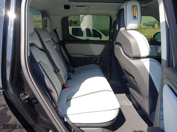 2022 Rivian R1T Launch Edition with VIN 7FCTGAAL1NN010340, listed as a IAAI auction lot 41656762 with 0 mi miles. Bid and sale history available at carsss.com. Image 8.