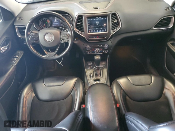 2019 Jeep Cherokee Trailhawk with VIN 1C4PJMBX1KD456551, listed as a Copart auction lot 58576065 with 121,259 mi miles and Salvage title. Bid and sale history available at DreamBid. Image 8.