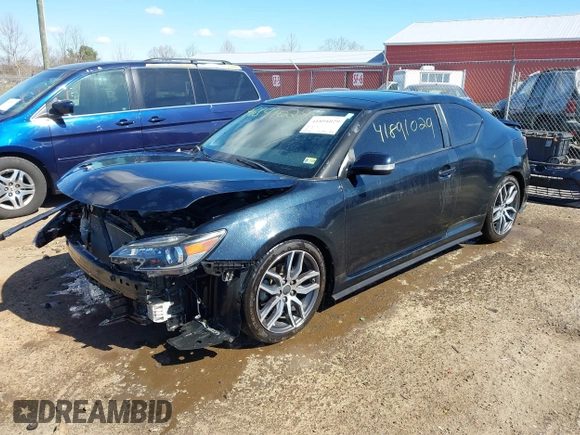 2016 Scion tC with VIN JTKJF5C71GJ020893, listed as a IAAI auction lot 41891029 with 76,341 mi miles. Bid and sale history available at carsss.com. Image 18.