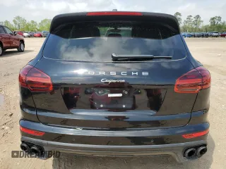 2018 Porsche Cayenne with VIN WP1AA2A27JKA04421, listed as a Copart auction lot 49601795 with 57,295 mi miles and Salvage title. Bid and sale history available at DreamBid. Image 6.