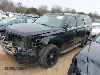 2015 Chevrolet Tahoe LT with VIN 1GNSCBKC5FR156050, listed as a IAAI auction lot 41486815 with 220,599 mi miles and . Bid and sale history available at DreamBid. Image 2.