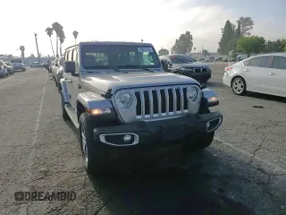 2019 Jeep Wrangler Unlimited Sahara with VIN 1C4HJXEN0KW616942, listed as a Copart auction lot 63501755 with 57,095 mi miles and Salvage title. Bid and sale history available at DreamBid. Image 14.