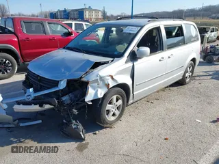 2010 Dodge Grand Caravan SXT with VIN 2D4RN5D17AR154594, listed as a IAAI auction lot 41751767 with Not Provided miles and . Bid and sale history available at DreamBid. Image 2.