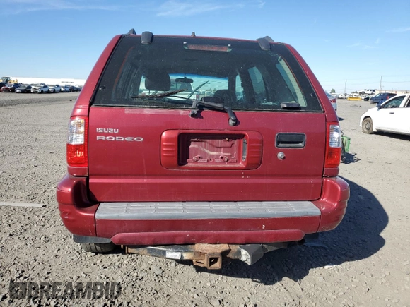 2004 Isuzu Rodeo S with VIN 4S2DM58W844300545, listed as a Copart auction lot 72277394 with Not Provided miles and Clean Title. Bid and sale history available at DreamBid. Image 6.
