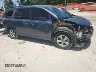 2015 Toyota Sienna LE AAS with VIN 5TDKK3DC2FS651385, listed as a Copart auction lot 62451275 with 166,610 mi miles and Salvage title. Bid and sale history available at DreamBid. Image 4.