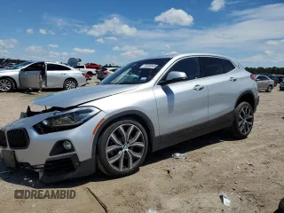 2020 BMW X2 sDrive28i with VIN WBXYH9C02L5R73046, listed as a Copart auction lot 56568645 with 57,592 mi miles and Salvage title. Bid and sale history available at DreamBid. Image 1.