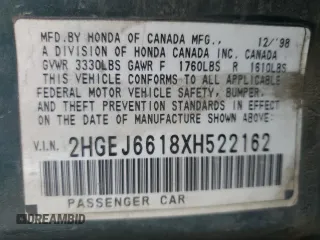 1999 Honda Civic VP z VIN 2HGEJ6618XH522162, wystawiony jako Copart lot #54427665 z przebiegiem 320 807 mil mil oraz Szkoda całkowita • Salvage title. Historia ofert i sprzedaży dostępna na DreamBid. Obrazek 12.