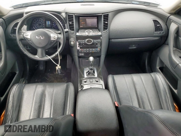 2017 Infiniti QX70 z VIN JN8CS1MU7HM141618, wystawiony jako Copart lot #59794075 z przebiegiem 114 272 mil mil oraz Szkoda całkowita • Salvage title. Historia ofert i sprzedaży dostępna na DreamBid. Obrazek 8.