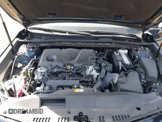 2019 Toyota Camry LE with VIN 4T1B11HK6KU276644, listed as a IAAI auction lot 42037249 with 23,677 mi miles and . Bid and sale history available at DreamBid. Image 10.