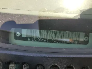 2003 GMC Yukon Denali z VIN 1GKEK63U53J210632, wystawiony jako Copart lot #56098925 z przebiegiem 258 313 mil mil oraz Szkoda całkowita • Salvage title. Historia ofert i sprzedaży dostępna na DreamBid. Obrazek 13.