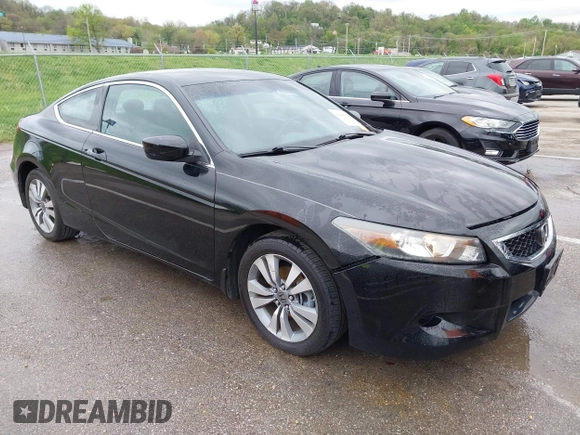 2009 Honda Accord LX-S with VIN 1HGCS12339A010440, listed as a IAAI auction lot 42045025 with 126,767 mi miles and . Bid and sale history available at DreamBid. Image 1.