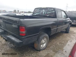 1999 Dodge Ram 1500 with VIN 1B7HF13Z3XJ556390, listed as a IAAI auction lot 41258681 with 274,653 mi miles. Bid and sale history available at carsss.com. Image 4.
