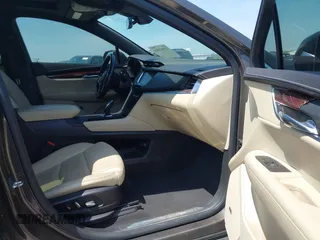 2019 Cadillac XT5 Luxury AWD z VIN 1GYKNDRS9KZ235687, wystawiony jako IAAI lot #41987360 z przebiegiem 78 784 mil mil oraz . Historia ofert i sprzedaży dostępna na DreamBid. Obrazek 5.