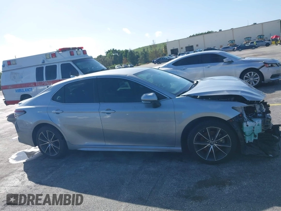 2023 Toyota Camry SE z VIN 4T1G11AK9PU805365, wystawiony jako IAAI lot #40647197 z przebiegiem 18 643 mil mil oraz . Historia ofert i sprzedaży dostępna na DreamBid. Obrazek 14.