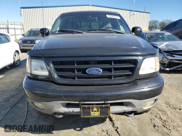 2002 Ford F-150 XL with VIN 1FTRF18232NA58109, listed as a Copart auction lot 79080674 with 148,213 mi miles and Salvage title. Bid and sale history available at DreamBid. Image 5.