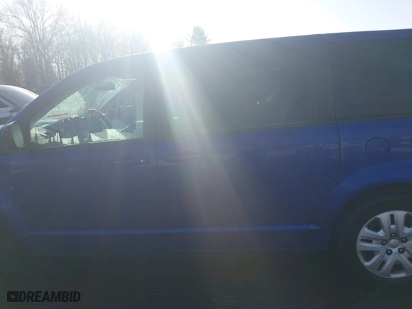 2018 Dodge Grand Caravan SE with VIN 2C4RDGBG8JR363409, listed as a IAAI auction lot 41129214 with 101,143 mi miles. Bid and sale history available at carsss.com. Image 14.