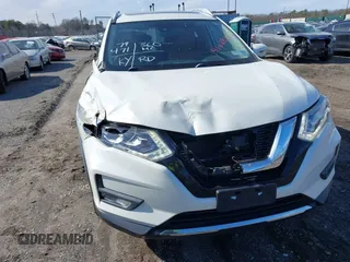2017 Nissan Rogue S with VIN JN8AT2MV5HW272571, listed as a IAAI auction lot 41628462 with 79,471 mi miles and . Bid and sale history available at DreamBid. Image 6.