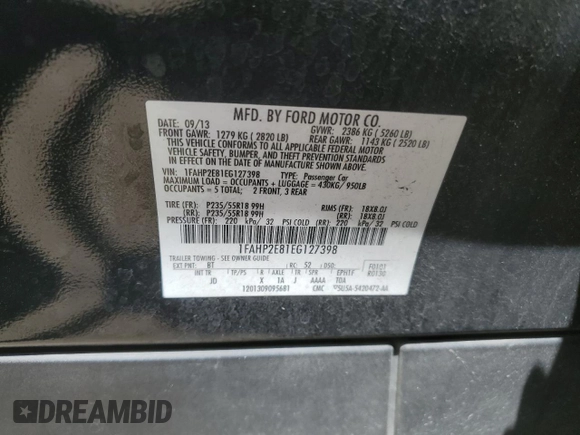 2014 Ford Taurus SEL z VIN 1FAHP2E81EG127398, wystawiony jako Copart lot #56666105 z przebiegiem 96 693 mil mil oraz Szkoda całkowita • Salvage title. Historia ofert i sprzedaży dostępna na DreamBid. Obrazek 12.