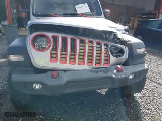 2018 Jeep Wrangler Unlimited Sport S with VIN 1C4HJXDG0JW250952, listed as a IAAI auction lot 41641476 with 117,284 mi miles. Bid and sale history available at carsss.com. Image 21.