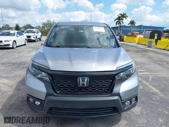 2021 Honda Passport Sport with VIN 5FNYF8H24MB004016, listed as a IAAI auction lot 41696379 with 85,373 mi miles and . Bid and sale history available at DreamBid. Image 12.