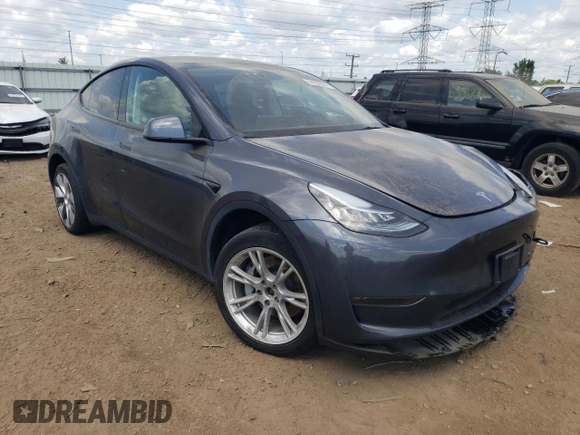 2022 Tesla Model Y Long Range with VIN 7SAYGDEE3NA007737, listed as a Copart auction lot 64602984 with 42,597 mi miles and Salvage Title. Bid and sale history available at carsss.com. Image 4.