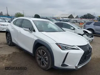 2022 Lexus UX with VIN JTHX3JBH2N2052061, listed as a IAAI auction lot 41878323 with 36,902 mi miles. Bid and sale history available at carsss.com. Image 1.