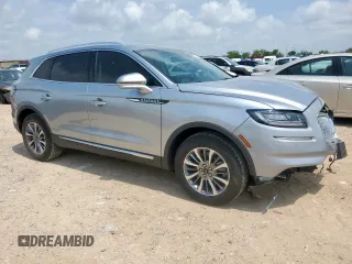 2021 Lincoln Nautilus Standard with VIN 2LMPJ6J97MBL10890, listed as a Copart auction lot 57860015 with 7,052 mi miles and Salvage title. Bid and sale history available at DreamBid. Image 4.
