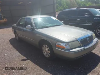 2003 Mercury Grand Marquis LS Premium z VIN 2MEFM75W53X691700, wystawiony jako IAAI lot #41952048 z przebiegiem 208 747 mil mil oraz . Historia ofert i sprzedaży dostępna na DreamBid. Obrazek 1.