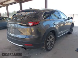 2021 Mazda CX-9 Signature with VIN JM3TCBEY9M0504963, listed as a IAAI auction lot 41756255 with 49,946 mi miles. Bid and sale history available at carsss.com. Image 4.