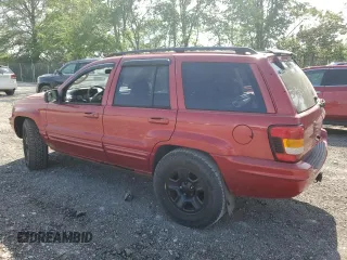 2002 Jeep Grand Cherokee Limited with VIN 1J4GW58N82C182603, listed as a Copart auction lot 57464295 with 240,179 mi miles and Salvage title. Bid and sale history available at DreamBid. Image 2.