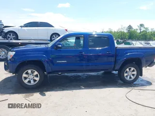 2015 Toyota Tacoma with VIN 3TMLU4EN1FM187705, listed as a IAAI auction lot 42119222 with 115,471 mi miles and . Bid and sale history available at DreamBid. Image 14.