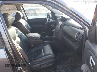 2012 Honda Pilot EX-L with VIN 5FNYF4H52CB034259, listed as a IAAI auction lot 41871625 with 159,577 mi miles and . Bid and sale history available at carsss.com. Image 5.