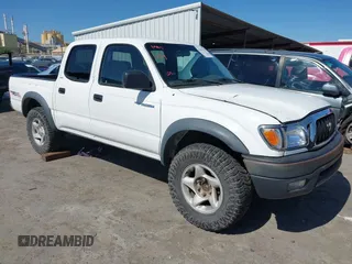 2001 Toyota Tacoma PreRunner z VIN 5TEGN92N91Z852586, wystawiony jako IAAI lot #42299321 z przebiegiem 233 111 mil mil oraz . Historia ofert i sprzedaży dostępna na DreamBid. Obrazek 1.