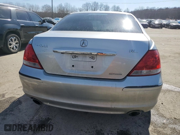2007 Acura RL Technology z VIN JH4KB16677C001125, wystawiony jako Copart lot #46943485 z przebiegiem 191 097 mil mil oraz Szkoda całkowita • Salvage title. Historia ofert i sprzedaży dostępna na DreamBid. Obrazek 6.