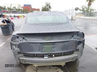 2018 Tesla Model 3 Long Range Battery with VIN 5YJ3E1EB7JF114305, listed as a IAAI auction lot 41765994 with 76,945 mi miles and . Bid and sale history available at DreamBid. Image 17.