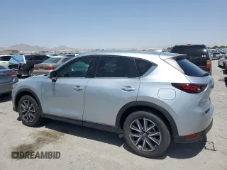 2018 Mazda CX-5 Grand Touring with VIN JM3KFBDM0J0377243, listed as a Copart auction lot 62199295 with 37,930 mi miles and Salvage title. Bid and sale history available at DreamBid. Image 2.