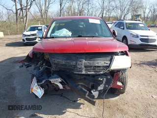 2009 Dodge Journey SXT with VIN 3D4GG57V19T523670, listed as a IAAI auction lot 41918151 with 181,218 mi miles. Bid and sale history available at carsss.com. Image 12.